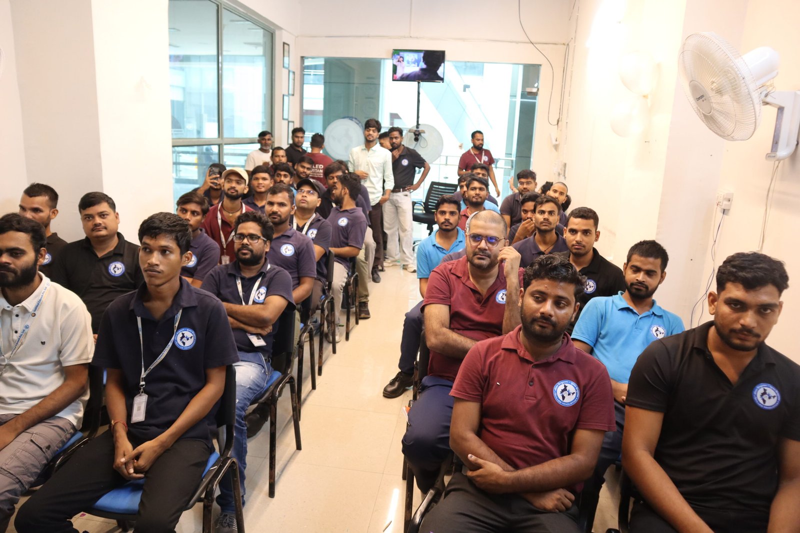 Students learning technical equipment during practical training